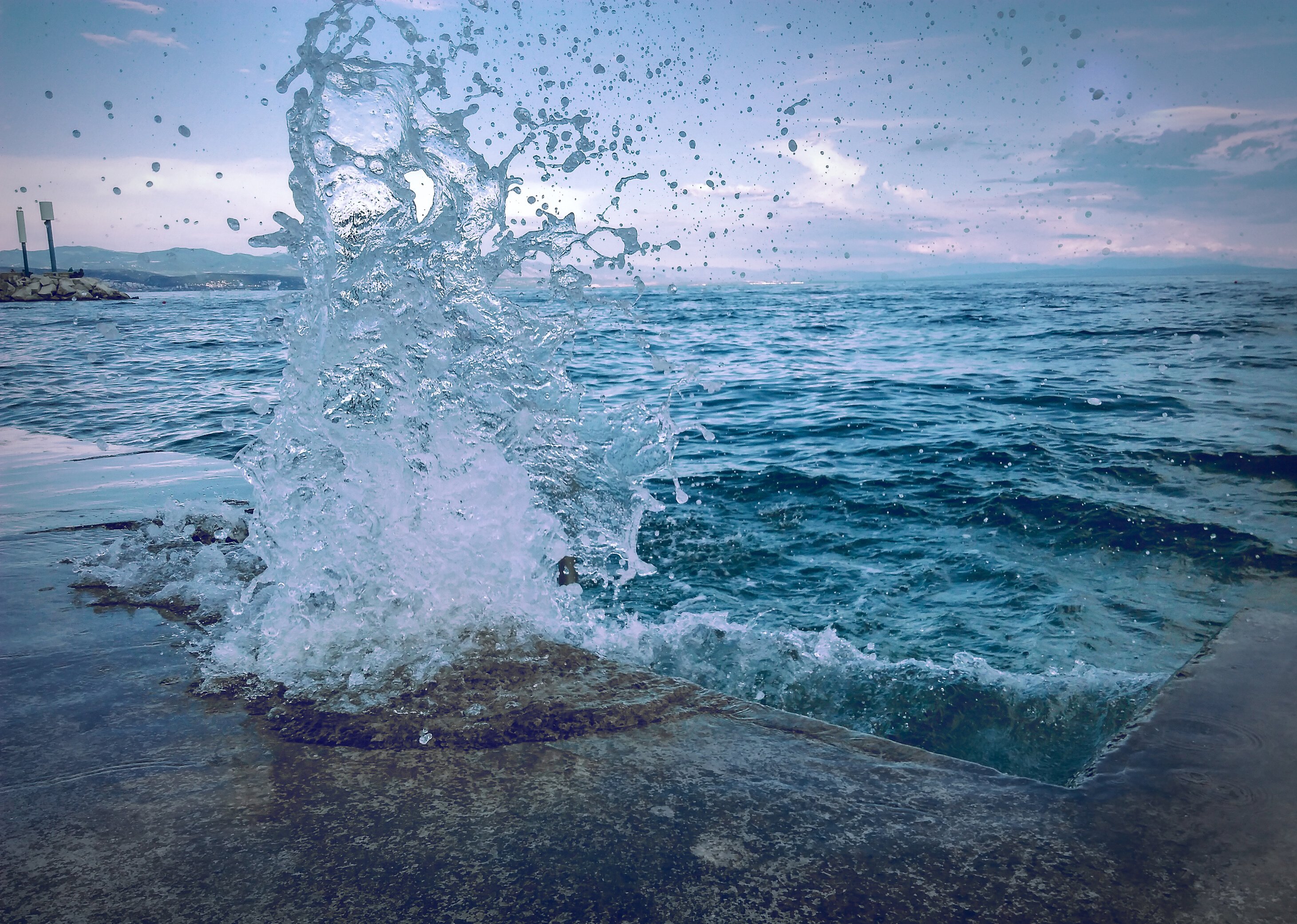 Water Smashing On Concrete Pavement